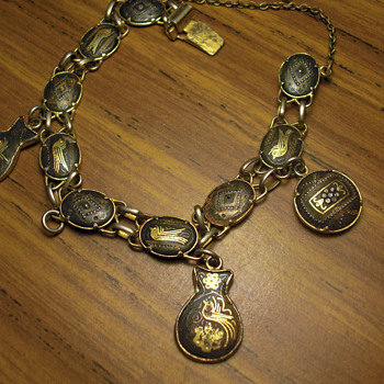 Unknown antique charm bracelet