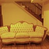 What is the origin and worth of this Victorian Couch with Swans and Violin carvings?