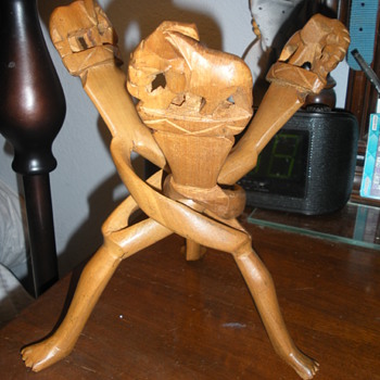 Wood Figurine  carved elephants on interlocking legs