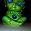 Green elf, with light up blue eyes and tummy.