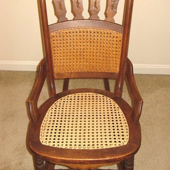 Unusual wood and cane ladies rocking chair
