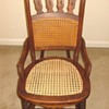 Unusual wood and cane ladies rocking chair
