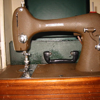 International Sewing Machine and the box of attachments