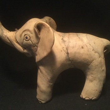 I love elephants, and this strange piece came my way - Figurines