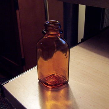 pls help identify this small, 1/2round, 1/2 square bottle.  1950?