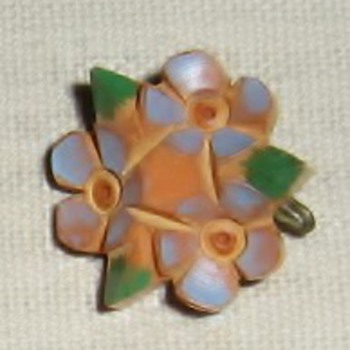 Tiny bakelite pins from 1930's?