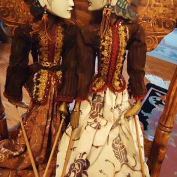 2 Maybe Indonesian wood puppets with nice bead earrings!