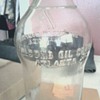 Holcomb Oil bottle