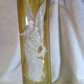 Closeup of a Angel with Child Mary Gregory vase - Art Glass