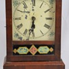 Antique Wooden Mantel Clock with Geometric Designs Maker Unknown