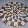Patched cowhide circle w/ fringe????