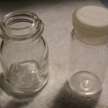 I THINK VINTAGE BOTTLES-- - Bottles