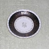 China saucer with black & gold design