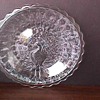 Information needed on small crystal Peacock plates with an M. 