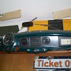 Guess what make of car this is dashboard now wall hanging comes from?