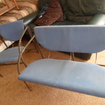 I need help identifying  the maker/designer of this love seat and chair set
