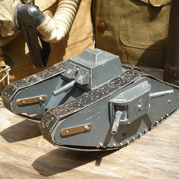 Incredible late 1910s WWI Mk IV female tank. Pressed steel, heavy clockwork, and early cast aluminum. 