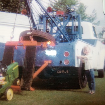 My favorite wrecker ,my pedal tractor and some little punk! - Photographs