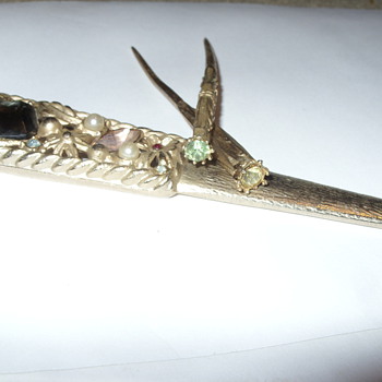 Letter opener with hair/hat sticks/pins