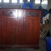 1953 Mahogany Console with an AM/FM radio and TrioMatic Record Player