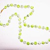 green plastic necklace