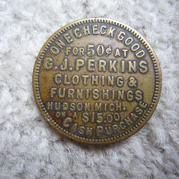 G.J. Perkins Clothing & Furnishings Hudson Mich. Good Luck Swastika Discount Token - US Coins