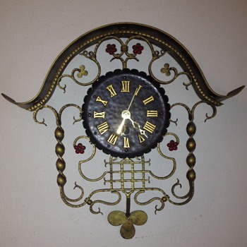 A metal clock - Clocks