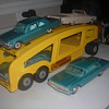 Structo autocarrier with 1963 Ford Galaxie promo cars heading to re-stoc k a dealership like the real thing!