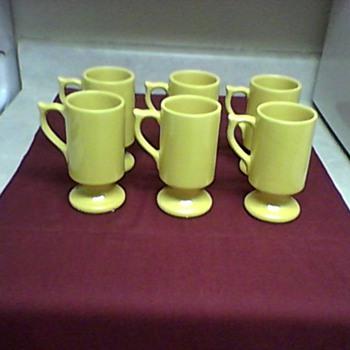 A SET OF  MC COY MUGS