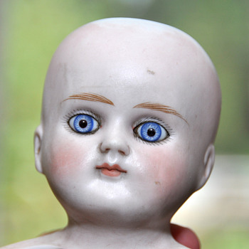Doll head, but who is it?