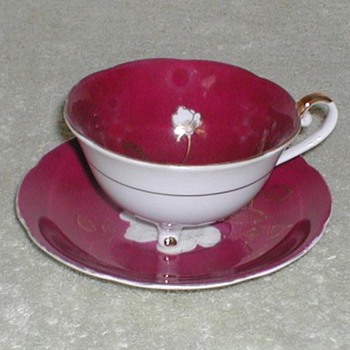 Porcelain cup & saucer wine color