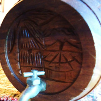 Hand carved keg?  Maybe Sake?  Asian for sure!