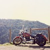 Motorcycle with a view to boot . Not sure what kind  
