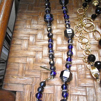 Unusual iridescent blue/gold plastic beads