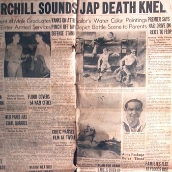 WWII 1943 newspaper articals about my grandfather's combat paintings 