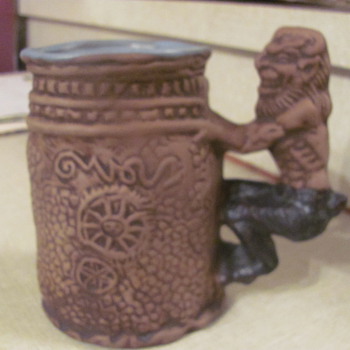 Rumph "peeping tom"  art pottery mug