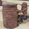 Rumph "peeping tom"  art pottery mug