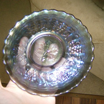 What is this plate? is it Carnival Glass? Did this go to a set?
