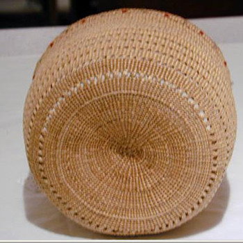 This is an Attu basket. It is a finely woven(by my people, Aleuts) its even water-proof. My tribes history goes back 9000 yrs