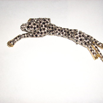 Jointed leopard pin, a fun pin to wear