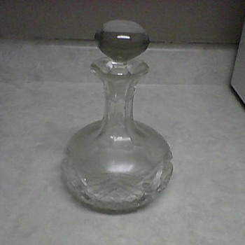 SEVERAL GLASS DECANTERS