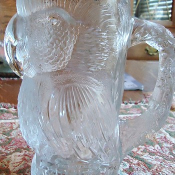 Owl pitcher from Tropicana, and tall pitcher, unknown maker