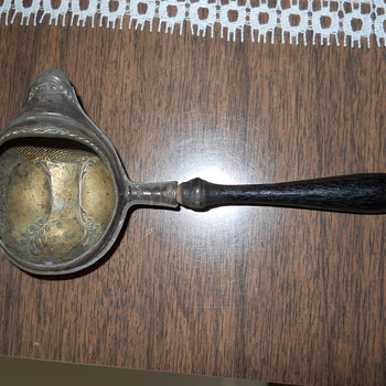 Told this is a very old tea strainer?   - Kitchen