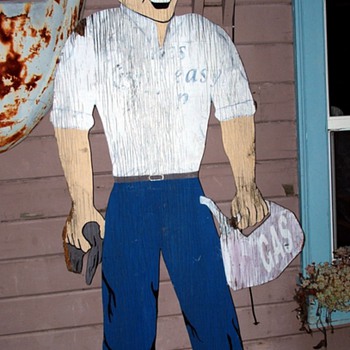an 8' tall sign from an old gas station in east oakland, california