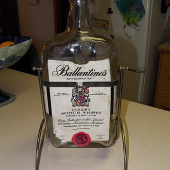 Ballantine's Finest Scotch Whisky with holder.  133 1/2 ounces. Establised 1827