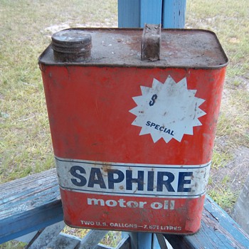 old oil and antifreeze cans