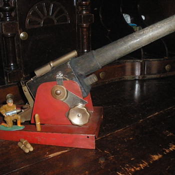 Baldwin Manufacturing Co. Cannon. 1930s wood and pressed steel.