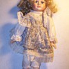 three dolls
