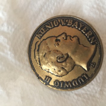 Another find in my collection of buttons - World Coins