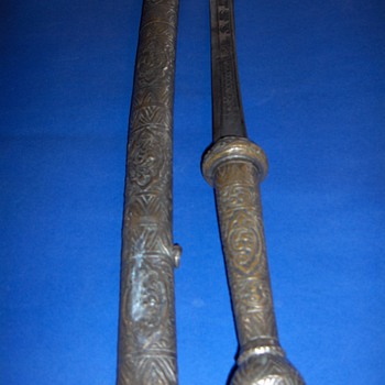 A Sword I found and I am clueless- Please Help
